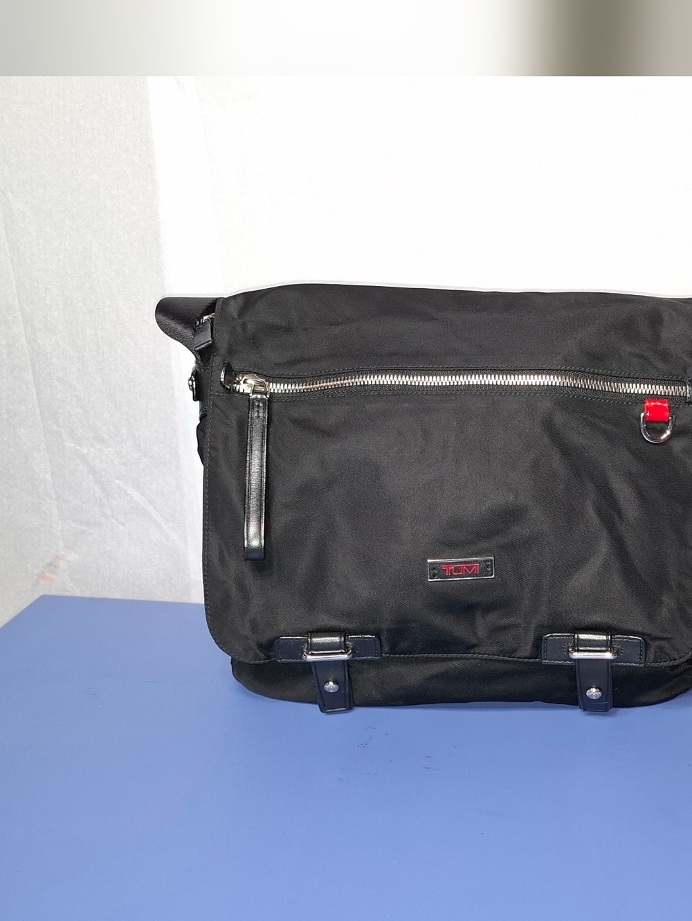 Tumi Black Crossbody Messenger Bag with Red Accent